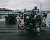 SRV-8 underwater remotely operated vehicle (ROV) from Oceanbotics, positioned on a boat deck, ready for deployment