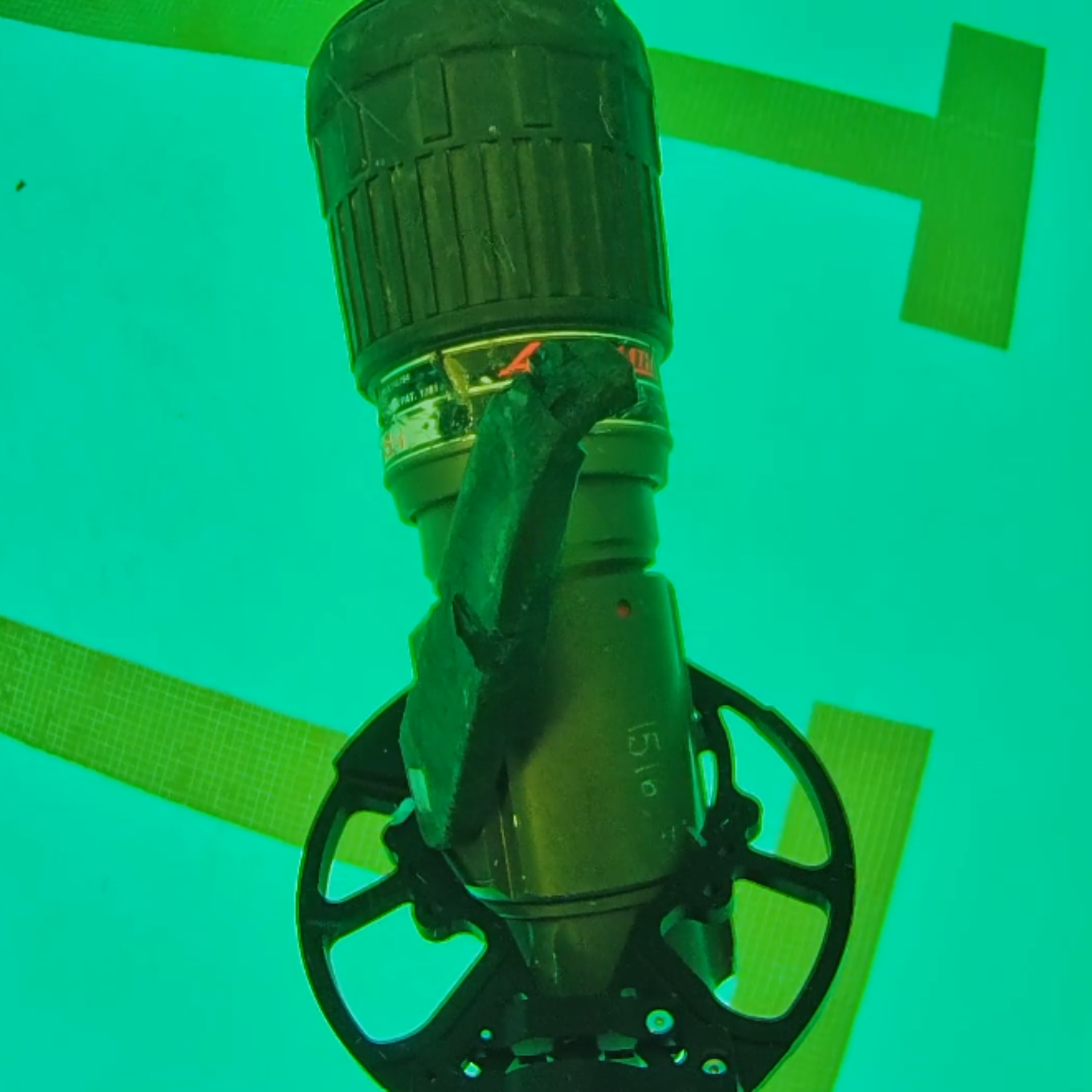 SRV-8 ROV 2-jaw manipulator grabber head retieving an object from the bottom of a pool.